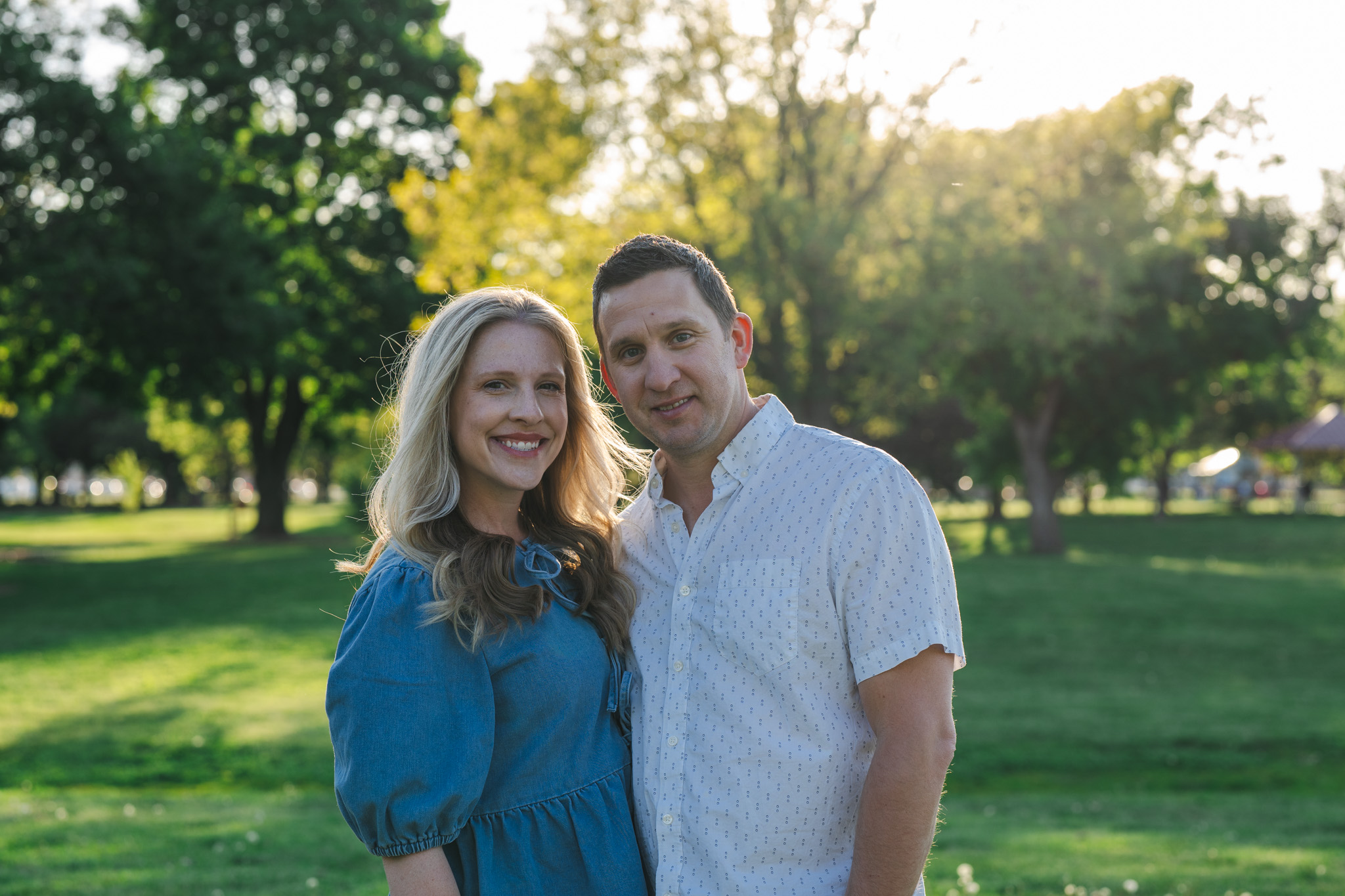 Omaha couples session — husband and wife at golden hour in the park